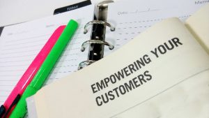 Notebook with title 'empowering your customers'